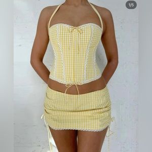 Yellow set top is medium skirt is small